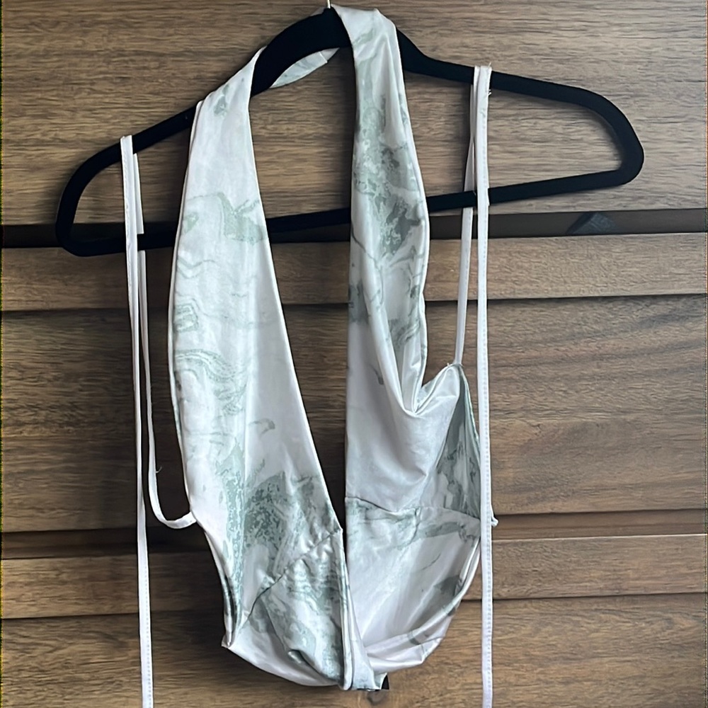 Front body, open back mint green shirt
